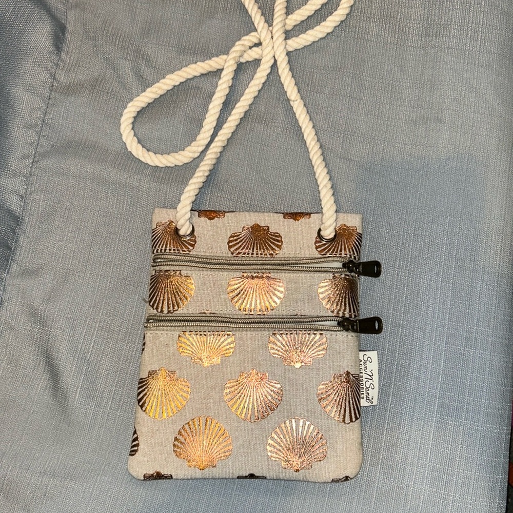 Sun n sand accessories crossbody bag gold shell design. Rope strap